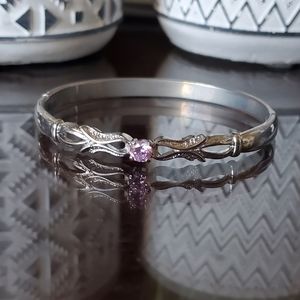 Silver bracelet with pink rhinestone